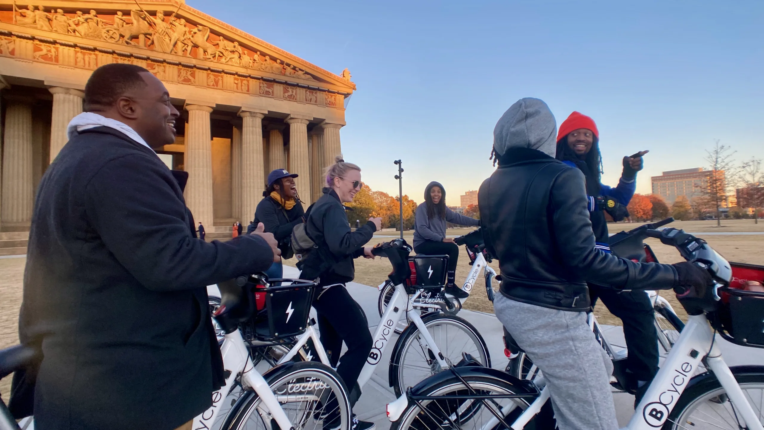 Group photo of Music City Dope Pedalers, a Nashville Community Riding group in front of the Nashville parthenon